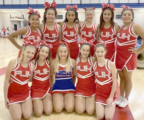 PJH CHEERLEADERS—The Perryton Junior High Cheer Squad recently attended NCA camp at OU in Norman. Squad members are, first row, from left, Ella Brady, Juliet Mier, NCA Cheer Buddy Presley, Brianna Galvez and Teagan Duke; and second row, Geraldine Gamez, Kaleigh Potts, Mily Bernal, Tana Williams, Natalie Hernandez and Nevaeh Martinez.