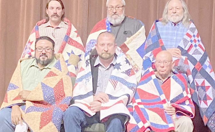 QUILTS OF VALOR PRESENTATION— The Friendship Quilt Guild held its annual Quilts of Valor presentation on Oct. 16. The first six recipients included, first row, from left, Frank Salgado Jr., Bear Knox and Butch Baker; and second row, Jordan Thomas, Freddy Bohannon and Terry Pillars.