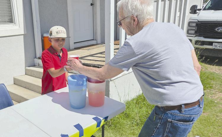 Lemonade stands are a great summer tradition for kids of all ages, and with temperatures on the rise, everyone could enjoy a chance to cut the summer heat with something cold and sweet. Alex Hernandez, age 10, at 421 S. Cedar, had his lemonade stand out last Saturday afternoon, offering delicious, ice-cold lemonade for just a dollar for Senn Slemmons.