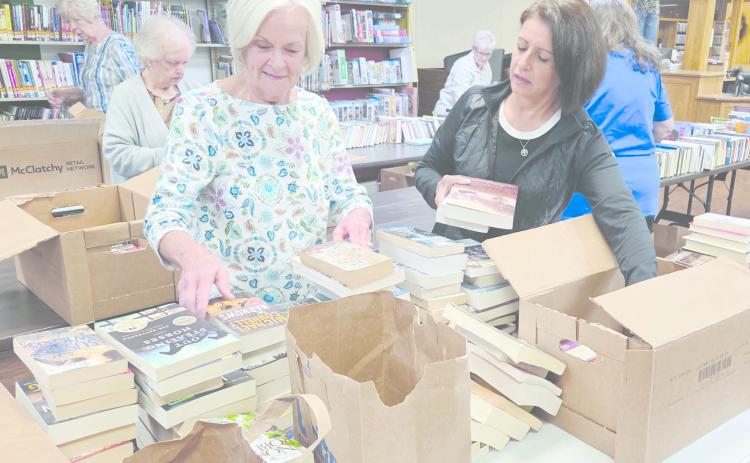 The Jennie June Club of Perryton will hold their fall Book Sale for 2026 at Perry Memorial Library during the month of October. Patrons can buy used books and videos at a bargain price, one dollar for hardbacks, 50 cents for paperbacks and $1 for videos during the month. Among the club members setting up for this year’s sale were Cynthia Adreas and Susie Najera.