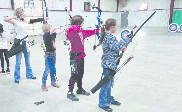 Ochiltree County 4-H Archery Club members have begun meeting and practicing their archery skills at the Ochiltree County Expo Center, in preparation for future competitions. The archery program at 4-H is always open to new participants — contact the Expo Center for more information. Pictured are, from left, Eden Salazar, Darlee George, Dawson Young, Gabe Love, and Gabrielle Heck.