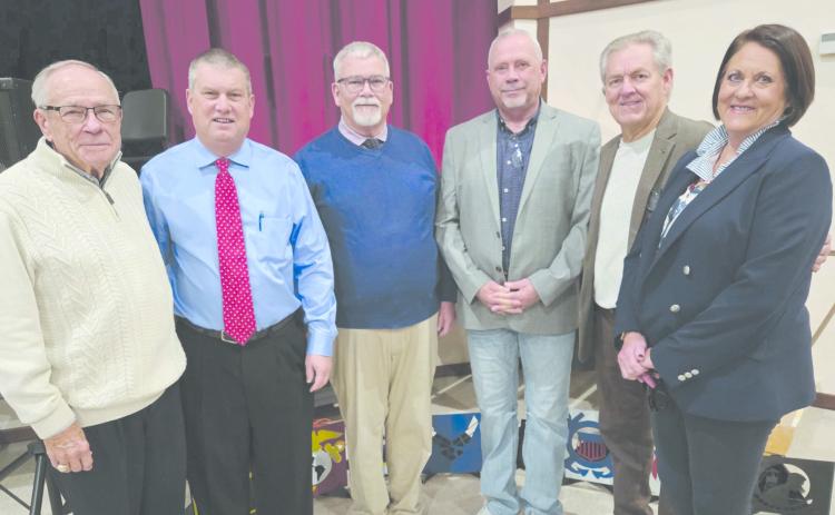 Perryton High School’s annual Veterans Day program brought together students of all ages to honor local veterans. In addition to presentations recognizing every veteran attendee, there were also musical and poetry performances. Pictured are, from left, registration volunteer Ken Splawn, Bill Bob Thrash and Keith Harris, who both led recognition of veterans, prayer leader Duce Cooper, master of ceremonies Marlon Sparks, and registration volunteer Lisa Yauck.