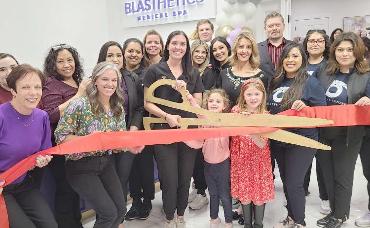 RIBBON CUTTING FOR BLASTHETICS AND AREA EYE CENTER— Perryton-Ochiltree Chamber of Commerce members, along with staff, family, and well-wishers, gathered recently for a ribbon-cutting ceremony to commemorate the grand opening of Blasthetics and Area Eye Center at 2309 S. Cedar in Perryton. Blasthetics is owned by Megan and Jay Blasingame, and Area Eye Center is owned by Dr. Stephanie Pulpan.