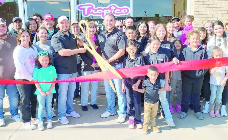 RIBBON-CUTTING HELD AT EL TROPICO— Members of the Perryton-Ochiltree Chamber of Commerce, along with friends, family, staff, and well-wishers were on hand for a ribbon-cutting ceremony for El Tropico at 10 SW 4th in Perryton. The ice cream shop is owned by Rafael Estrada And Gerardo Delgado.