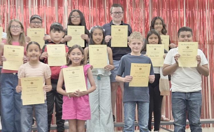 Williams Intermediate School fourth graders receiving American Legion outstanding citizenship awards were, first row, from left, Larissa Roberson, Reina Ortega Perez, Adelyn Olivas, Jax Cunningham, Erik Romero, and American Legion representative J.W. Brown; second row, Arabella Alanize, Lizzie Allred, Alexander Moya, Daniela Becerril Hernandez, and Mailen Reyes; and third row, Ayden Pedroza, Jeffery Hinshaw, Adrian Hernandez, Aleysa Ontiveros, Maverick Kerl, and Emily Osuna