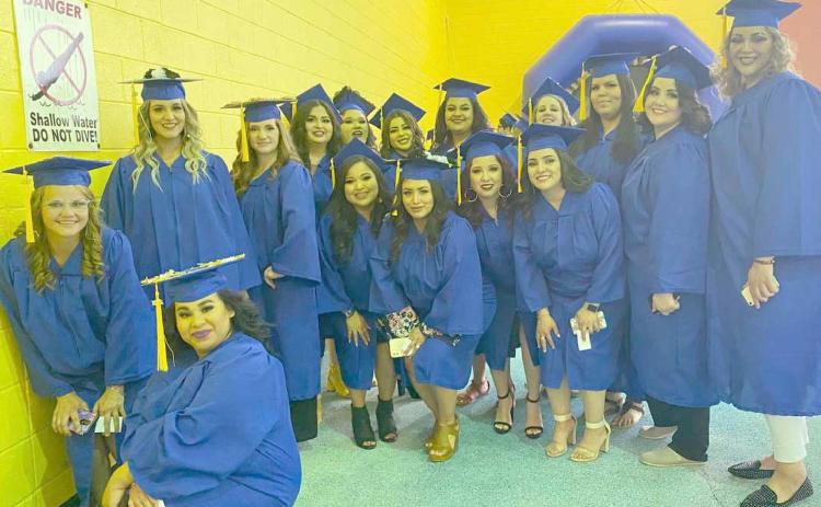 COSMETOLOGY STUDENTS GRADUATE