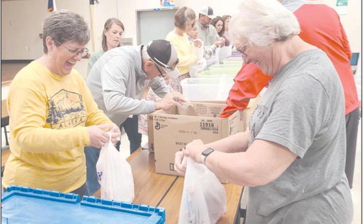 VOLUNTEERS COMING TOGETHER