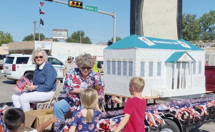 PARADE WINNERS - SECOND PLACE NON-PROFIT—Ochiltree County residents lined Main Street on Saturday, Aug. 19 to watch the annual Wheatheart of the Nation Celebration parade. The second place prize for the Non-Profi t Float category went to the Wolf Creek Chapter of National Society Daughters of the American Revolution.