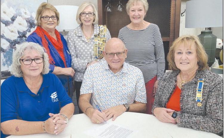 MAYOR SIGNS PROCLAMATION FOR CONSTITUTION WEEK Perryton Mayor Kerry Symons signed a proclamation this week recognizing the local Wolf Creek chapter of the National Society Daughters of the American Revolution and Constitution Week, which runs from Sept. 17-23. Pictured from left, front row, are: Debra Dye, Mayor Kerry Symons, and Chapter Regent Sherrie Rima; back row: Nan Schwalk, Barbara Johnson, and Cynthia Symons.