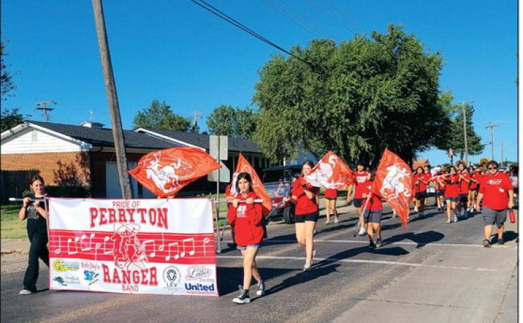 MARATHON MARCHING The Pride of Perryton Ranger Band held a March-a-Thon Saturday morning as they took a three-mile march from the high school, to Williams Intermediate, over to Stark Park, across to Perryton Junior High School, and then back to PHS. The event helps raise funds for the band’s spring trip, helps offset the costs of this year’s marching show, and gets band members a little more marching practice before Saturday morning’s Wheatheart of the Nation Celebration parade.