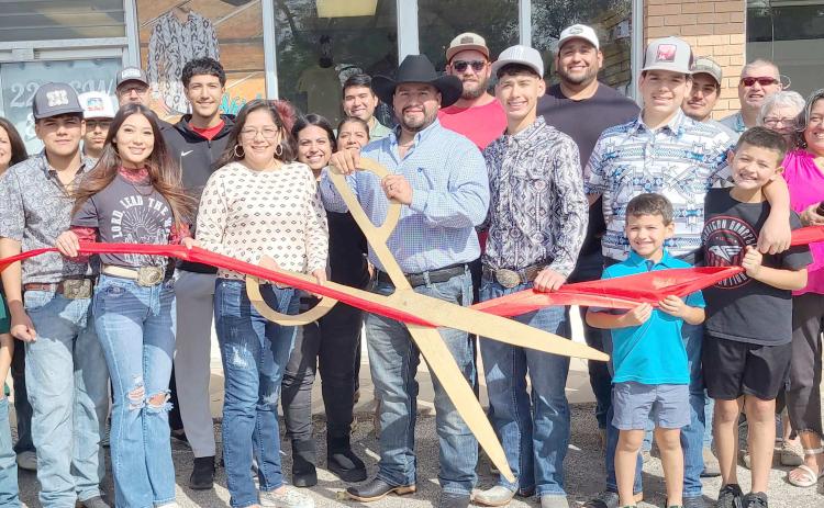 RIBBON-CUTTING HELD AT S&Y WESTERN WEAR—Members of the Perryton-Ochiltree Chamber of Commerce, along with friends, family, staff, and well-wishers were on hand recently for a ribbon-cutting ceremony for S&Y Western Wear at 220 SW 3rd Street in Perryton. The Western wear store is owned by Samuel and Yaneli Alvarez.