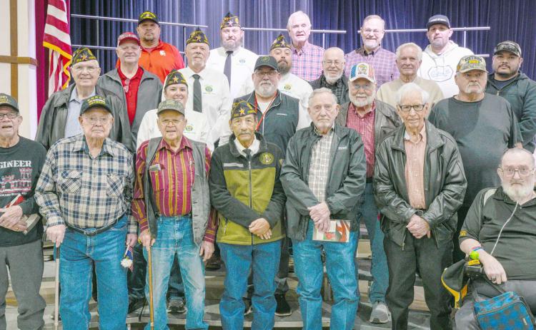 Area veterans were honored at Perryton High School’s annual Veterans Day program on Nov. 12. Pictured are, from left, front row, Don Simpson, Robert Mantooth, Neal Davis, Charlie Ludi, Byerl Bates, Don Hulsey, and Robert Overton; second row, Dempsey Malaney, Nikki Green, Dunningan McWhorter, Dr. H.R. Sharp, and Raymond Holt; third row, Mike Richardson, J.W. Hardy, J.W. Brown, Arvel Wall, Doug McGarraugh, and Gerardo Rosales; and back row, Frank Pacheco, Chase Allison, Danny Thurman, Nathan Ellzey, and Ryan
