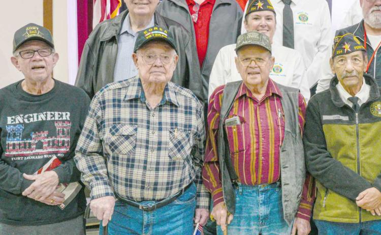 Area veterans were honored at Perryton High School’s annual Veterans Day program on Nov. 12. Pictured are, from left, front row, Don Simpson, Robert Mantooth, Neal Davis, Charlie Ludi, Byerl Bates, Don Hulsey, and Robert Overton; second row, Dempsey Malaney, Nikki Green, Dunningan McWhorter, Dr. H.R. Sharp, and Raymond Holt; third row, Mike Richardson, J.W. Hardy, J.W. Brown, Arvel Wall, Doug McGarraugh, and Gerardo Rosales; and back row, Frank Pacheco, Chase Allison, Danny Thurman, Nathan Ellzey, and Ryan