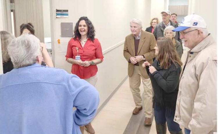 TOURING THE FACILITY—Staff members at the new Perryton Health Center, housed in the L. Kirk Courson Building, adjacent to Ochiltree General Hospital, conducted building tours during the grand opening and open house at the health center. The facility has 32 exam rooms on 14,626 square feet, with space for nine potential health care providers.