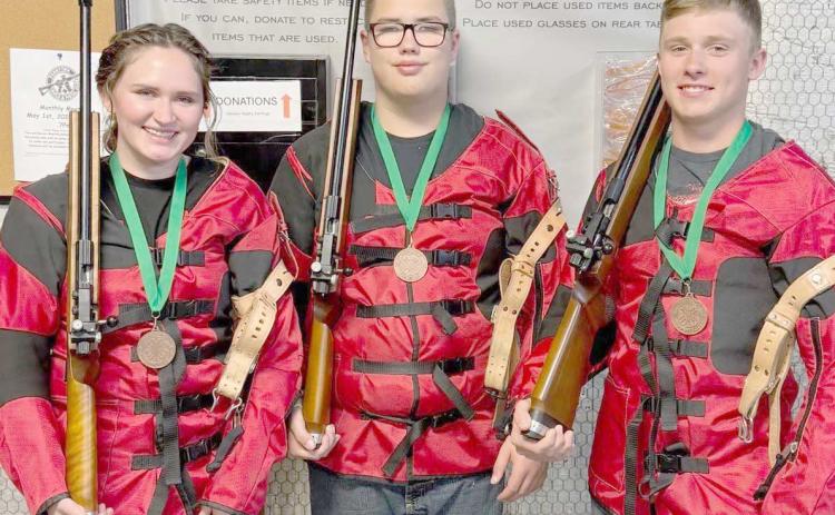 4-H MEMBERS QUALIFY FOR STATE —Ochiltree County 4-H members competed recently at the Panhandle District 4-H Roundup contests in Amarillo, and three qualified for state competition. Pictured are, from left, Rylan Oquin, Nathan Knox, and Kyle Oquin, who placed third overall as a team in the senior division of the .22 Rifle competition and qualified for state. Rylan Oquin also qualified for state in the senior Musical Instrument division of the Talent Contes