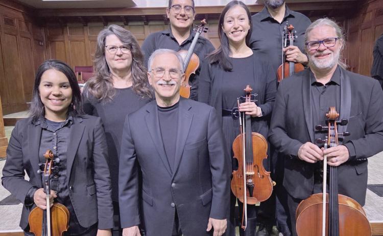MESSIAH INSTRUMENTALISTS—A number of orchestra musicians from the Amarillo Symphony, as well as local musicians, were on hand to help perform the 70th annual performance of Handel’s “The Messiah” on Sunday, Nov. 30. Pictured are, from left, front row: Keila Silva (fi rst violin), Dr. Jim Rauscher (organ), and Jayson Bishop (cello); second row: Janelle Buschman (piano) and Irma Borup (viola); back row: Bryan Gomez (second violin) and Matt Arambula (fi rst violin). Not pictured are Danielle Kupresanin (second