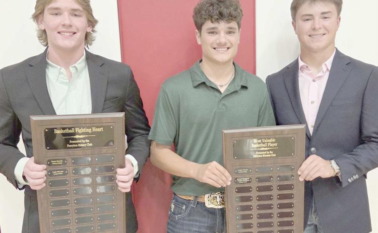 Perryton High School’s boys basketball team was honored on May 4 at the Perryton High School All Sports Awards Banquet. Pictured are, from left: Cash Wheeler, winner of the Fighting Heart award, and Keenan Daugherty and Cooper Schilling, who received the boys MVP award.
