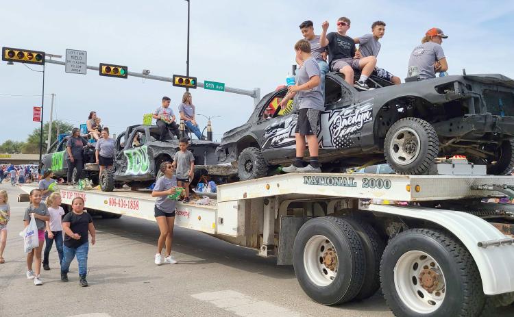 DEMOLITION DERBY PARADE WINNER— Main Street was lined with thousands of people on Aug. 20 who turned out to enjoy the annual Wheatheart of the Nation Celebration parade. The top prize in the parade’s Demolition Derby Cars category went to the IOU team.