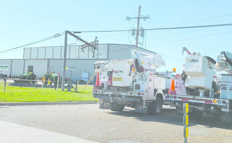 A tractor pulling a tandem disc plow accidentally caused a power outage across much of Perryton on Tuesday morning after its extended wings became tangled in power lines on SW 24th Avenue near Western Equipment. The tractor pulled a number of electric lines down and snapped a power pole. Electric service was out for several hundred homes for less than two hours before Xcel Energy crews were able to restore power.
