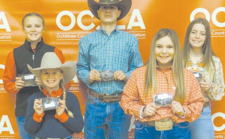 The Reserve Grand Champion winners were presented with their Buckle Awards at this year’s Ochiltree County Junior Livestock Show and Sale on Jan. 20-21. Pictured are, from left, front row: Lakyn Boxwell (Reserve Grand Champion Steer) and Avery Swenhaugen (Reserve Grand Champion Swine); back row: Payton Schilling (Reserve Grand Champion Goat), Treven McKinley (Reserve Grand Champion Heifer), and Averi Pshigoda (Reserve Grand Champion Lamb). (Photo Credit: Brittany Morgan)