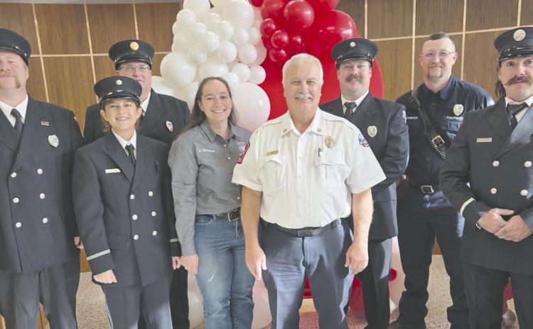 City of Perryton staff, supervisors, council members, and citizens gathered on Dec. 5 for a retirement reception for longtime Fire Department Chief Paul Dutcher. Dutcher had been the city’s Fire Chief for 35 years. Pictured are, from left, Thomas Beal, Amanda Cowan, Ronnie Robinson, Olivia Thompson, Chief Dutcher, Collin Manross, Will Schafer, and Jordan Thomas.
