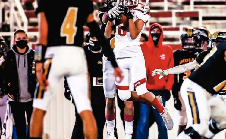NICE CATCH Isaac Castro (#8 junior) intercepts the Seminole QB and secured another turnover for the Ranger defense against the Seminole Indians Friday during Homecoming festivities at Ranger Field. The Rangers took th e contest, 28-14. See story for more information. (Photo by David Erickson)