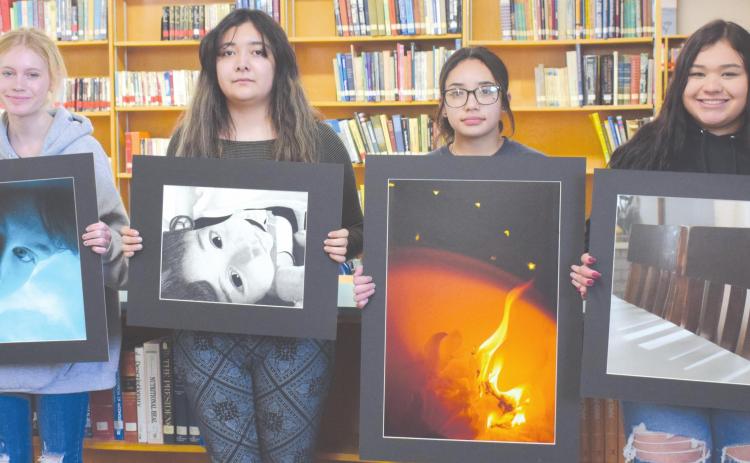 PHS ARTISTS QUALIFY FOR STATE Four Perryton High School art students qualified for the state competition after PHS students participated in the Visual Art Scholastic Event (VASE) State Qualifiers in March. Pictured from left are Hallye Pingelton (Photography 1), Jennifer Castro (Art 1), Rocio Rodriguez (Photography 1), and Genesis Mendoza (Photography 1).