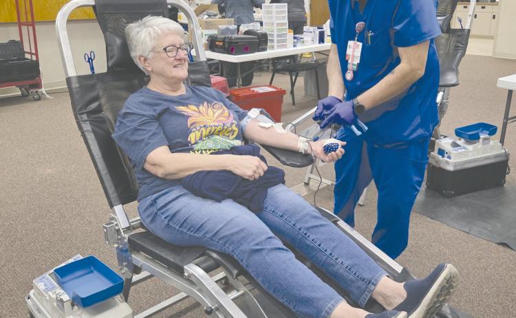 Coffee Memorial Blood Center in Amarillo held a blood drive on Tuesday afternoon at Frank Phillips College, Allen Campus, as they sought to increase the number of blood donors in the area and the amount of blood donated for the entire region. Pictured are, from left, Joan Quist and Coffee Blood Center phlebotomist Joseph Shipp. Quist said her blood type is O negative, one of the most sought-after blood types, so she tries to donate whenever she can.