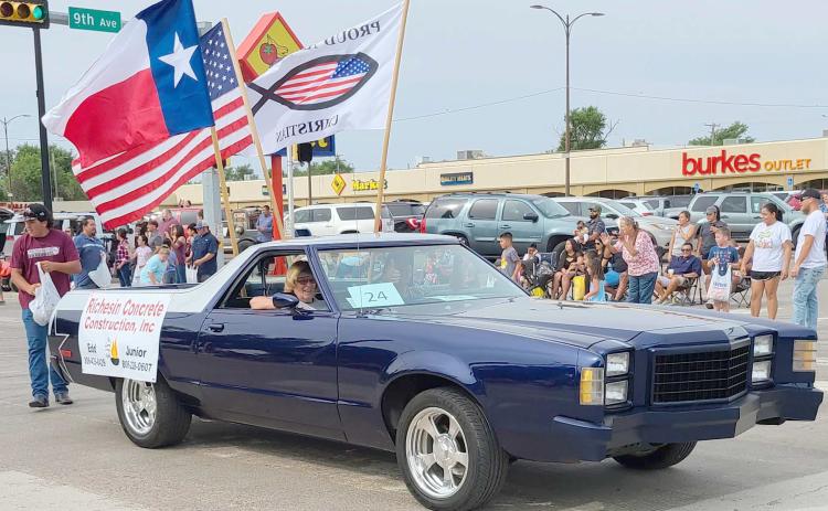 NON-CLASSIC OR ANTIQUE AUTO WINNER— The annual Wheatheart of the Nation Celebration parade on Main Street attracted viewers from all over the area. The winner of the Non-Classic or Antique Auto category was Richesin Concrete.