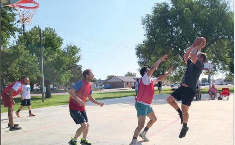 Local basketball players got together on Saturday morning, Aug. 3, for some friendly competition in a 3v3 basketball tournament at Whigham Park. The tournament benefitted the Ludi Pena Martin Foundation and attracted players and fans from all over the city.