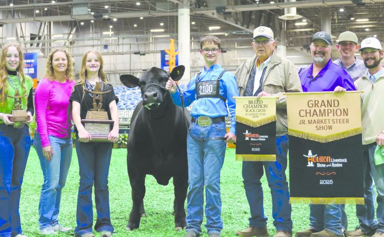 SCHICKEDANZ SHOWS GRAND CHAMPION STEER AT HOUSTON PHS sophomore Jack Schickedanz exhibited the Grand Champion Steer at the Houston Livestock Show, as well as the Grand Champion Market Steer at the Austin Rodeo. Jake’s steer was selected out of 2,000 steers in Houston. Pictured are, from left, Maddie Schickedanz, Amber Schickedanz, Sydney Schickedanz, Kareem the steer, Jake Schickedanz, Larry Schickedanz, Jason Schickedanz, mentor Kirby Eaves, and steer coach Kyle Tarter.