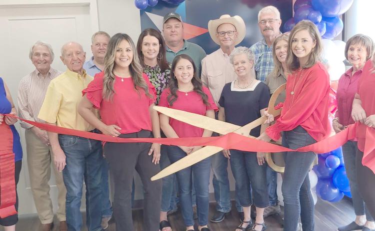 Perryton-Ochiltree Chamber of Commerce members gathered for a ribbon-cutting ceremony for the relocation of Texas Farm Bureau Insurance at 15 SE 5th Avenue, north of the county courthouse, in Perryton.