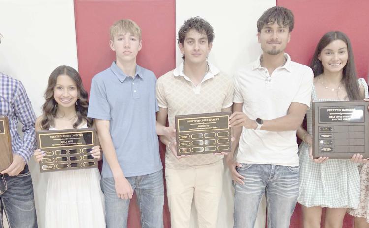 Perryton High School’s cross country teams were honored on May 4 at the Perryton High School All Sports Awards Banquet. Pictured are, from left: Alex Grajeda, boys Fighting Heart award; Kynsie Tarango, girls MVP; Jacob Erickson, Emanuel Soto, and Max Esquivel, boys MVPs; and Alexa Rosales and Kayman Vanosdol, girls Fighting Heart awards.