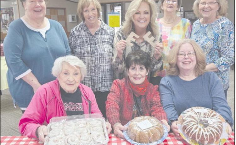 The Senior Citizens Center held their annual Easter Bake Sale on Wednesday, bringing in over $600 as lovers of baked goods bought all the delicious treats they could. The Senior Center holds the bake sale every year to bring in more funds so they can keep prices of their thrice-weekly lunches low. Pictured are, from left, front row: Berwyn Flowers, Bonnie Schaef, and Toni Boren; back row: Corene Munday, Linda Kile, Daryla Allred, Charlotte Cape, and Pat Bilson.