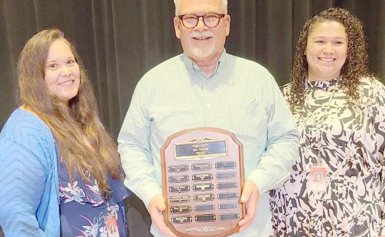 TEACHER OF THE YEAR— This year’s Excellence in Education Award, presented during the annual awards ceremony at Perryton High School on May 1, was presented to PHS choir teacher Keith Harris. Pictured are, from left, PHS principal Tori Little, Harris, and vice principal Francis Zavala.