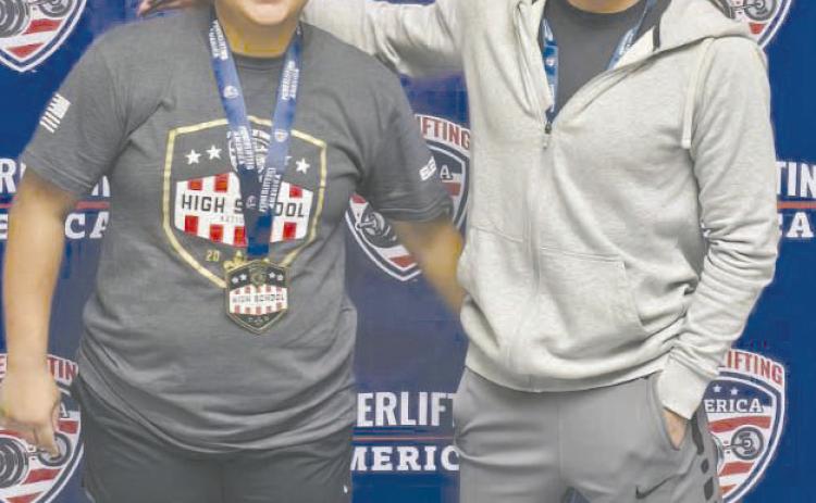 Vanessa Chavira, left, and Jonathan Becerril brought home national champion titles from the meet held in New Orleans last weekend. Two other lifters, Angel Flores and Javier Martinez were the national champ runners up.