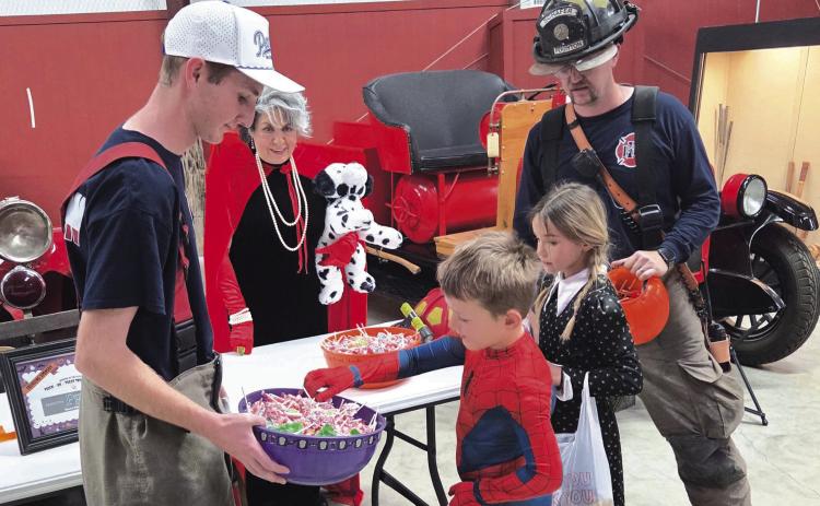 Kids and parents looking to show off their new costumes, grab some candy, and check out the historical exhibits at the Museum of the Plains turned out in droves for Saturday evening’s “Trick or Treat Through Time” event. Local businesses and organizations, including the Perryton Fire Department and Perryton Furniture, set up booths all over the museum to hand out treats and enjoy the Halloween fun.