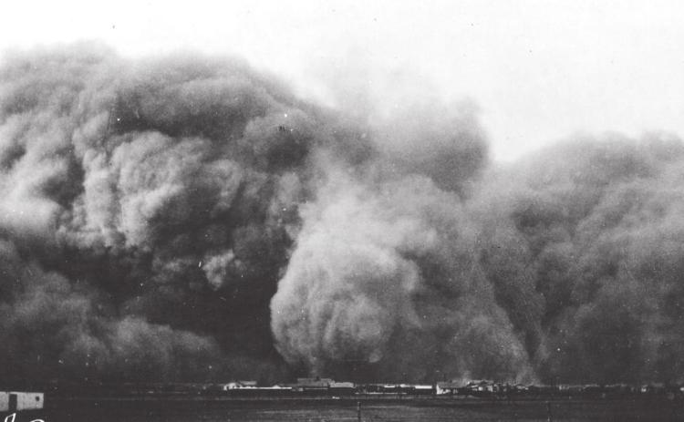 PANHANDLE DUSTER — This dust storm which moved into Perryton on Sunday, April 14, 1935, was one of the worst recorded during the “Dirty Thirties.” This storm continued for about 12 hours, turning day into night. It was one of many such storms which swept through the Perryton area during this decade of depression and crop failure.