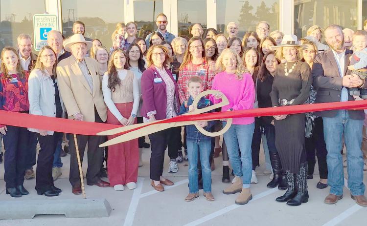 RIBBON-CUTTING HELD AT PERRYTON HEALTH CENTER— Staff members at Ochiltree General Hospital and members of the Perryton-Ochiltree Chamber of Commerce, along with friends, family, staff, and well-wishers were on hand recently for a ribbon-cutting ceremony for the new Perryton Health Center, located adjacent to OGH at 3101 Garrett Drive.