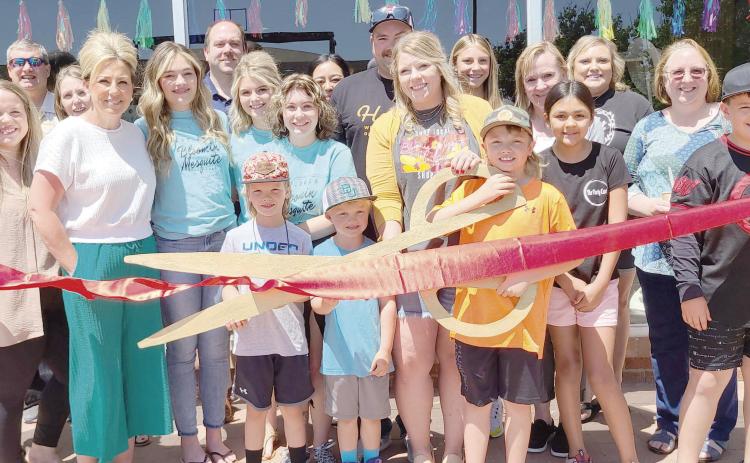 Members of the Perryton-Ochiltree Chamber of Commerce, along with friends, family, staff, and well-wishers were on hand for a ribbon-cutting ceremony for the grand opening of Bloomin Mesquite Boutique at 404 S. Main in Perryton. The clothing boutique is owned by Kylie Boothe.