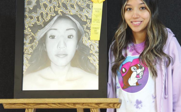 ENRIQUEZ WINS BEST OF SHOW Perryton High School’s annual art show will run from May 2-10 during school hours at the high school. Visitors can also see the displayed art after school hours on May 2 and on May 9. The Best in Show and purchase prize award went to Denisse Enriquez for “Heart of Gold,” a pencil drawing with gold foil. Enriquez also received a $150 cash prize for her winning artwork.