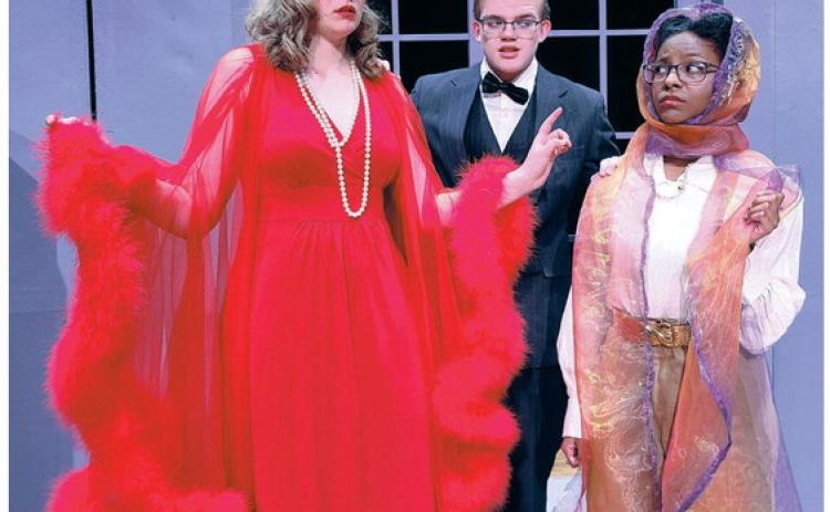 Perryton High School’s Theatre Department performed in UIL One-Act Play District competition on Tuesday here in Perryton, qualifying as Alternate. Perryton’s play was “Suite Surrender” by Michael McKeever. The farce is set at a luxury hotel in the 1940s as two Hollywood divas are accidentally booked into the same suite. Pictured are, from left, Braylee Brown as Athena Sinclair, Zavier Kinney as hotel manager Bernard S. Dunlap, and Tiana Hill as Claudia McFadden.