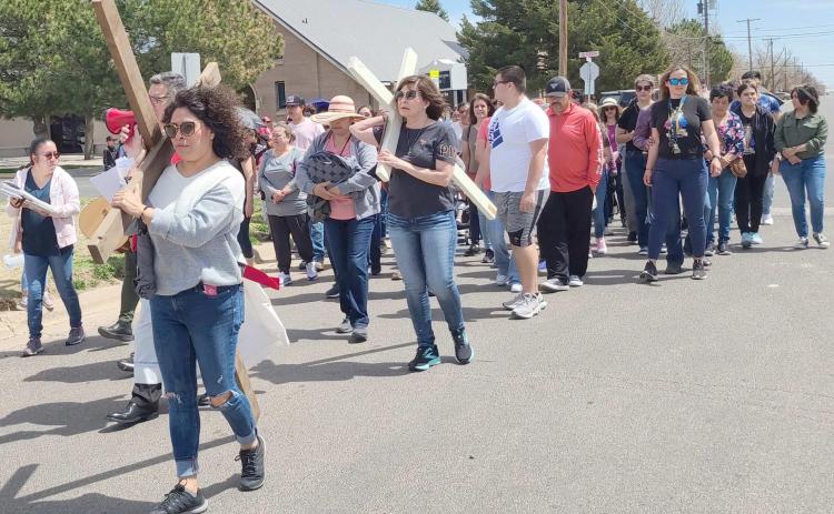 WALKING THE STATIONS OF THE CROSS—