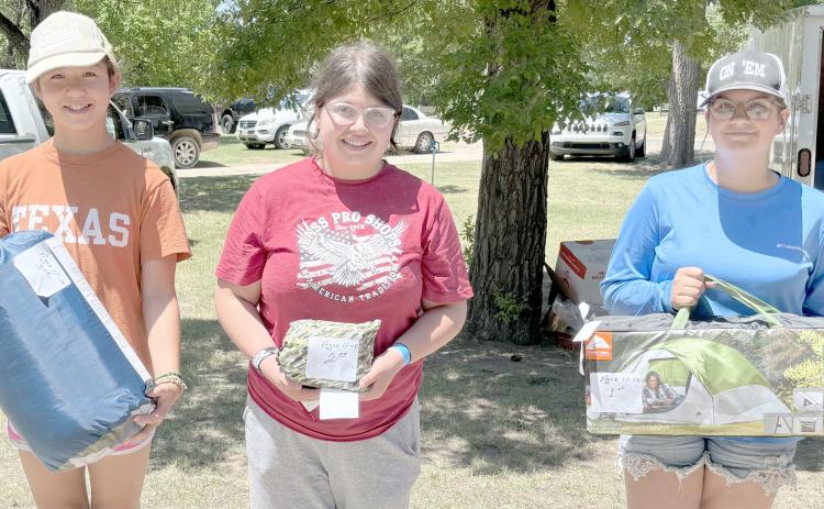 Young anglers showed up to compete in the Children’s Fishing Tournament at Lake Fryer and Wolf Creek Park at the beginning of June. The annual fishing tourney is hosted by the Wolf Creek Park Improvement Board. The top prize winners in the ages 11-14 category were, from left, Annalise Cotta (third place), Autumn Gonzales (second place), and Khole Scott (first place).