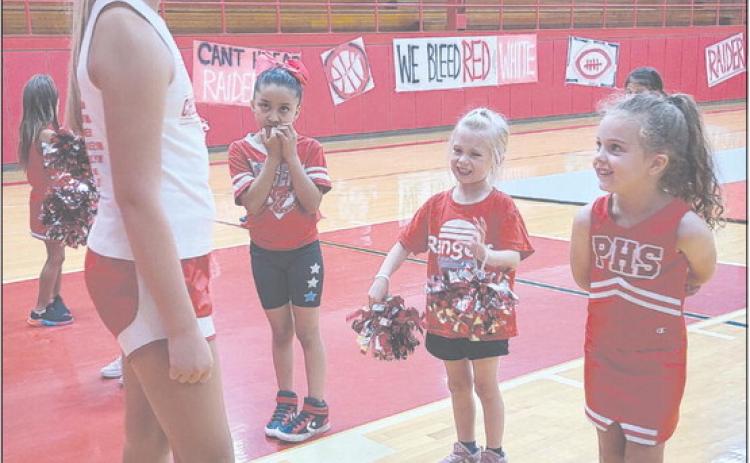 Sure, there are drills and cheer practice and learning dances and all the hard work, but half the fun of cheer camp has got to be hanging out with the big cheerleaders, right? Perryton Junior High School’s cheerleaders hosted the PJH Mini Cheer Camp this week from Monday through Wednesday. Future cheerleaders in grades kindergarten through fifth grade were welcome to attend.