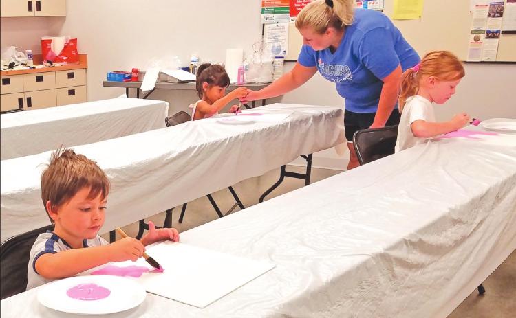 PEEWEE PUPILS PAINTING PINK PAGES