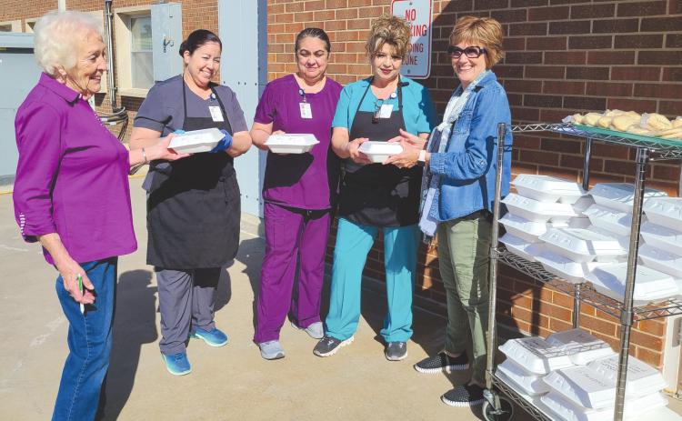 LOADING UP FOR MEALS ON WHEELS