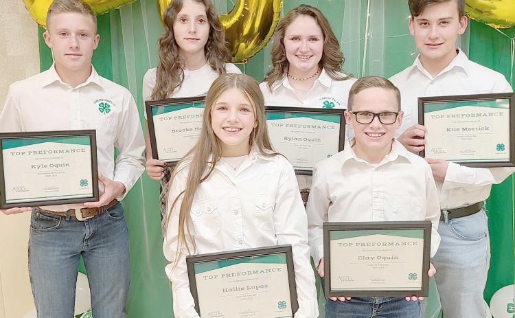HIGH POINT WINNERS— Ochiltree County 4-H held itsannual awards ceremony Oct. 9 at the Ochiltree County Expo Center. The High Point Award winners were, from left, front row, Hallie Lopez and Clay Oquin; and back row, Kyle Oquin, Brooke Helker, Rylan Oquin, and Kile Merrick.