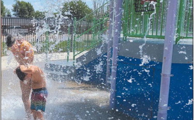 COOLING OFF It’s been brutally hot in Perryton and Ochiltree County, and that’s made the Perryton Municipal Water Park a very popular place to be, with the splash pad offering a great way for younger kids to get completely soaked. This is the last week the pool will be open for the season, with Sunday set as the pool’s last day ‘til next summer.