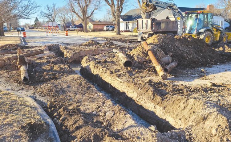 WATER LINE REPAIRS IN PROGRESS AT COLGATE AND 11TH